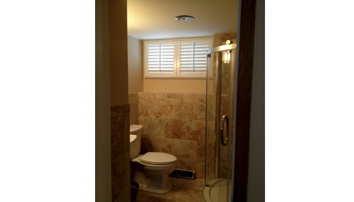 Shutters on basement bathroom window